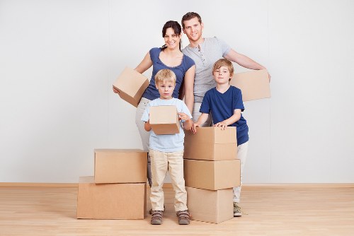 Local packing team organising boxes for a property relocation in Ilford